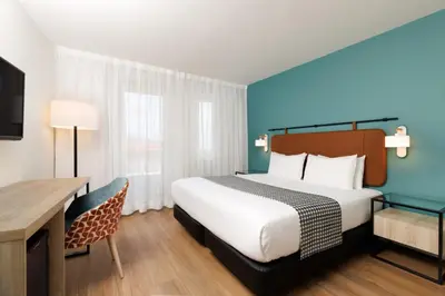 Ein Bett oder Betten in einem Zimmer der Unterkunft Exe Vienna