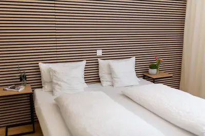 Ein Bett oder Betten in einem Zimmer der Unterkunft HOTEL MARIA