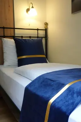 Ein Bett oder Betten in einem Zimmer der Unterkunft Pension Liechtenstein