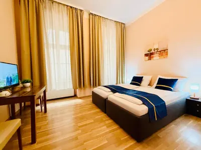 Ein Bett oder Betten in einem Zimmer der Unterkunft Pension Liechtenstein