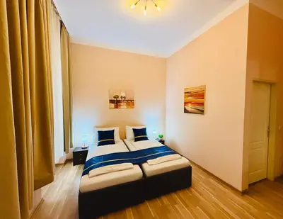 Ein Bett oder Betten in einem Zimmer der Unterkunft Pension Liechtenstein