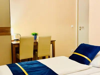 Ein Bett oder Betten in einem Zimmer der Unterkunft Pension Liechtenstein
