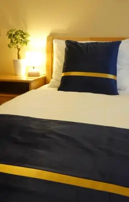 Ein Bett oder Betten in einem Zimmer der Unterkunft Pension Liechtenstein