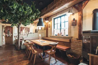 Ein Restaurant oder anderes Speiselokal in der Unterkunft Weinwirtshaus Wlaschits