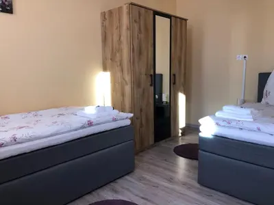 Ein Bett oder Betten in einem Zimmer der Unterkunft Pension Hammrich