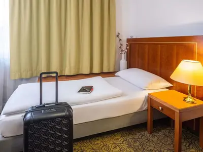Ein Bett oder Betten in einem Zimmer der Unterkunft Hotel Mercure Wien Westbahnhof
