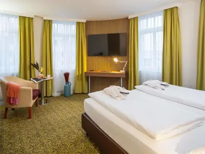 Ein Bett oder Betten in einem Zimmer der Unterkunft Hotel Mercure Wien Westbahnhof