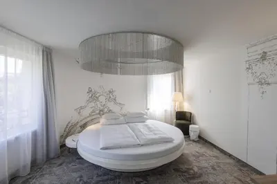 Ein Bett oder Betten in einem Zimmer der Unterkunft ARCOTEL Kaiserwasser Wien