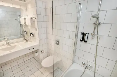 Ein Badezimmer in der Unterkunft ARCOTEL Kaiserwasser Wien