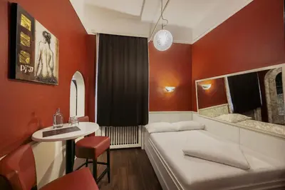 Ein Bett oder Betten in einem Zimmer der Unterkunft Hotel Goldene Spinne
