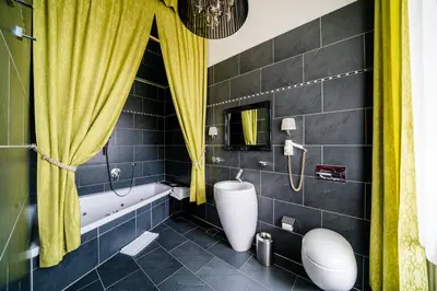 Ein Badezimmer in der Unterkunft Hotel Goldene Spinne