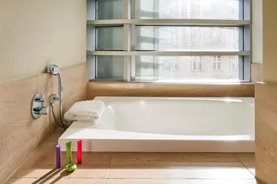 Ein Bett oder Betten in einem Zimmer der Unterkunft DO&CO Hotel Vienna