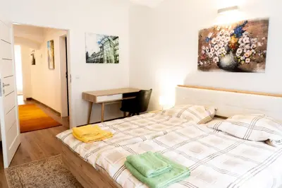 Ein Bett oder Betten in einem Zimmer der Unterkunft Dana's Apartment beim Augarten
