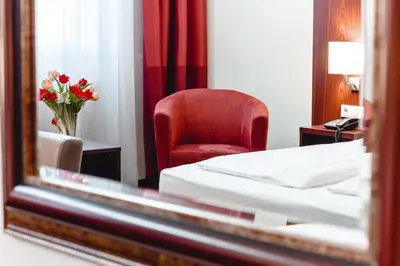 Ein Bett oder Betten in einem Zimmer der Unterkunft Hotel Allegro Wien