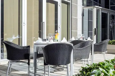 Ein Restaurant oder anderes Speiselokal in der Unterkunft NH Danube City