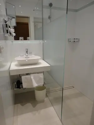 Ein Badezimmer in der Unterkunft City Hotel Albrecht