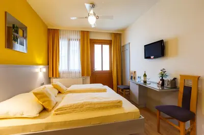 Ein Bett oder Betten in einem Zimmer der Unterkunft Weingut Franz Schindler