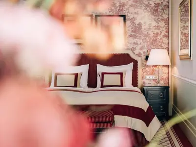 Ein Bett oder Betten in einem Zimmer der Unterkunft Hotel Sacher Wien