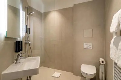 Ein Badezimmer in der Unterkunft DaunTown Rooms - Self Check-In