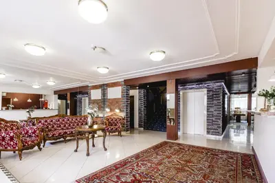 Ein Sitzbereich in der Unterkunft Hotel Hoffinger