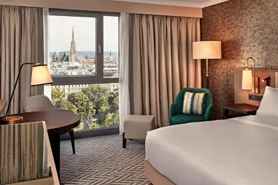 Ein Bett oder Betten in einem Zimmer der Unterkunft Hilton Vienna Park