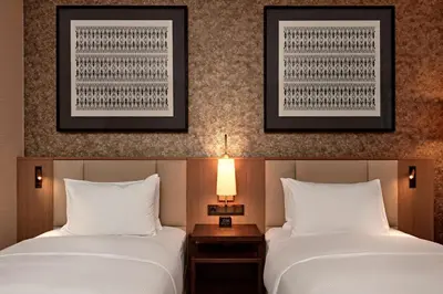 Ein Bett oder Betten in einem Zimmer der Unterkunft Hilton Vienna Park