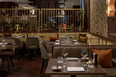 Ein Restaurant oder anderes Speiselokal in der Unterkunft Hilton Vienna Plaza