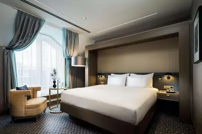 Ein Bett oder Betten in einem Zimmer der Unterkunft Hilton Vienna Plaza