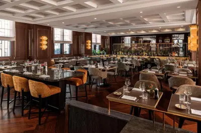 Ein Restaurant oder anderes Speiselokal in der Unterkunft Hilton Vienna Plaza
