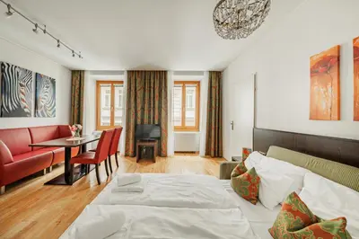 Ein Bett oder Betten in einem Zimmer der Unterkunft Serviced Apartments Josefstadt City