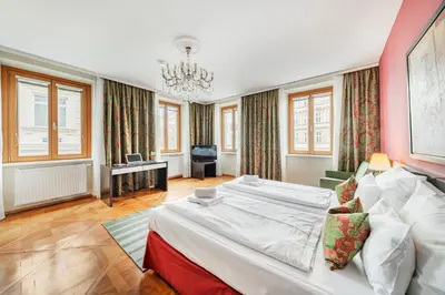Ein Bett oder Betten in einem Zimmer der Unterkunft Serviced Apartments Josefstadt City