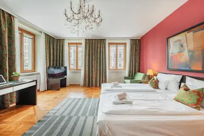 Ein Bett oder Betten in einem Zimmer der Unterkunft Serviced Apartments Josefstadt City