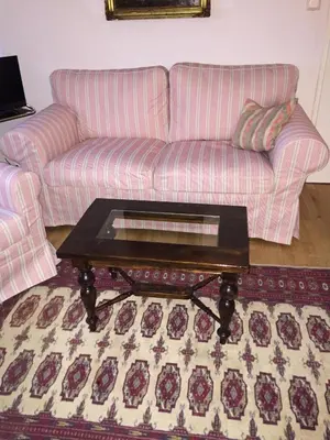 Ein Sitzbereich in der Unterkunft Exquisites Gartenapartment in eleganter Jugendstilvilla