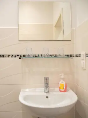 Ein Badezimmer in der Unterkunft Appartements CHE