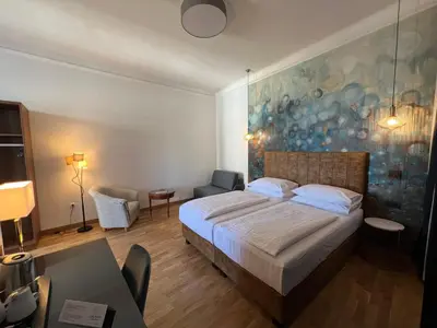 Ein Bett oder Betten in einem Zimmer der Unterkunft Hotel Secession an der Oper
