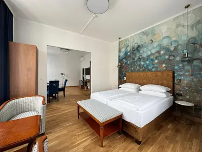 Ein Bett oder Betten in einem Zimmer der Unterkunft Hotel Secession an der Oper