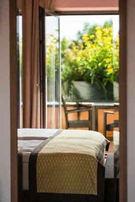 Ein Bett oder Betten in einem Zimmer der Unterkunft Hotel Turmhof