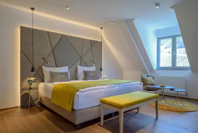 Ein Bett oder Betten in einem Zimmer der Unterkunft Hotel Turmhof