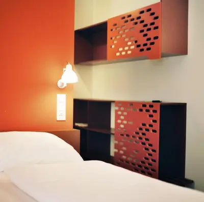 Ein Bett oder Betten in einem Zimmer der Unterkunft Kyriad Vienna Altmannsdorf