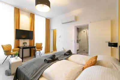 Ein Bett oder Betten in einem Zimmer der Unterkunft WF-Apartment Westbahnhof