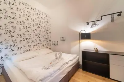 Ein Bett oder Betten in einem Zimmer der Unterkunft josef's home I Donald Duck Apartment