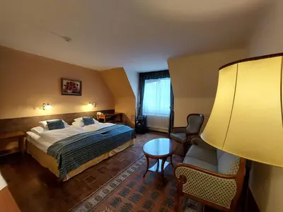 Ein Bett oder Betten in einem Zimmer der Unterkunft Hotel Apartment Rothensteiner
