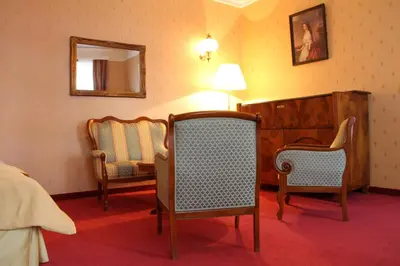 Ein Sitzbereich in der Unterkunft Hotel Apartment Rothensteiner