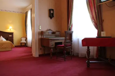 Ein Bett oder Betten in einem Zimmer der Unterkunft Hotel Apartment Rothensteiner