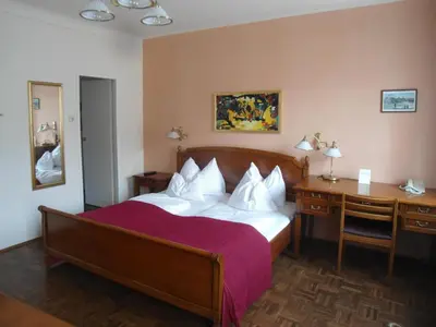 Ein Bett oder Betten in einem Zimmer der Unterkunft Hotel Apartment Rothensteiner