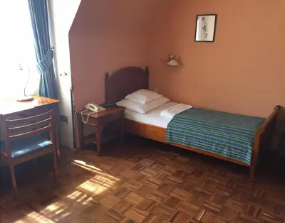 Ein Bett oder Betten in einem Zimmer der Unterkunft Hotel Apartment Rothensteiner