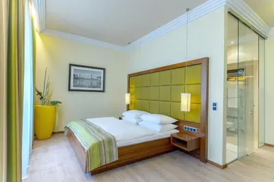 Ein Bett oder Betten in einem Zimmer der Unterkunft Hotel Vienna beim Prater