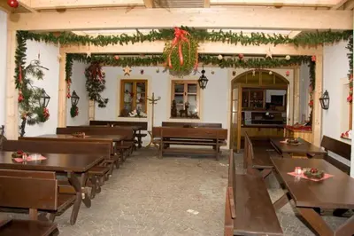 Ein Sitzbereich in der Unterkunft Gasthof Ludl