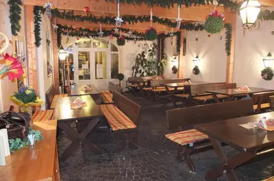 Ein Sitzbereich in der Unterkunft Gasthof Ludl