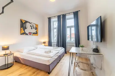 Ein Bett oder Betten in einem Zimmer der Unterkunft josef's home I Mickey Mouse Apartment
